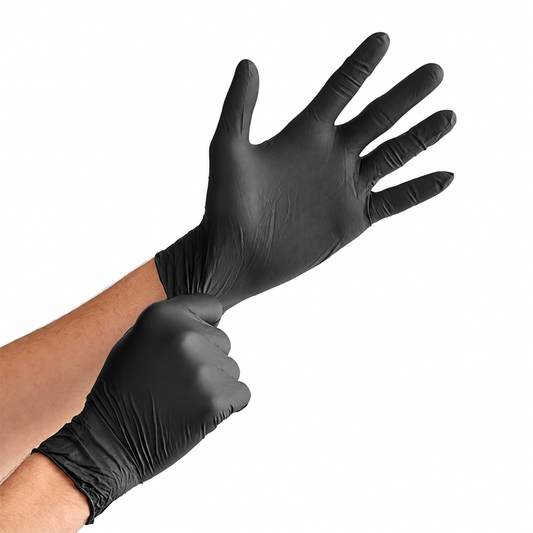 A hand stretching on a pair of 6 mil Black Disposible Nitrile Gloves for BBQing