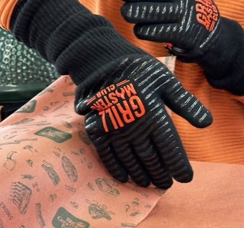 Close Up of Grilling Gloves Used to Wrap Pork with Butcher Paper